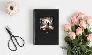 Fotobuch zur Hochzeit gestalten als Hardcover, Hochzeitspaar auf Cover